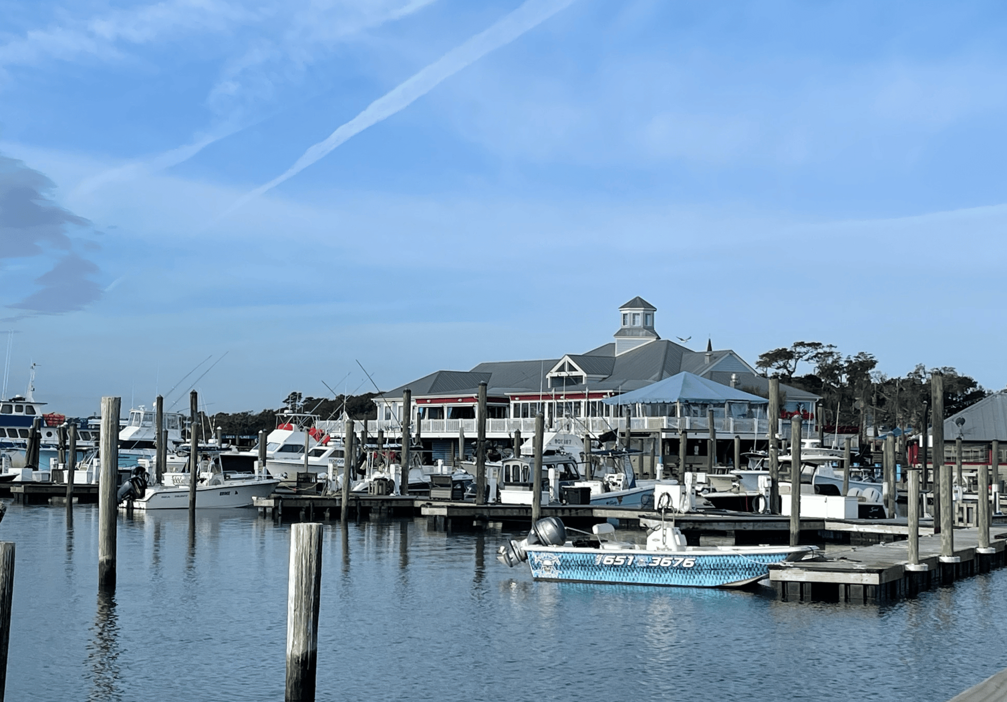 dockage at crazy sister marina a boat is docked next to a body of water