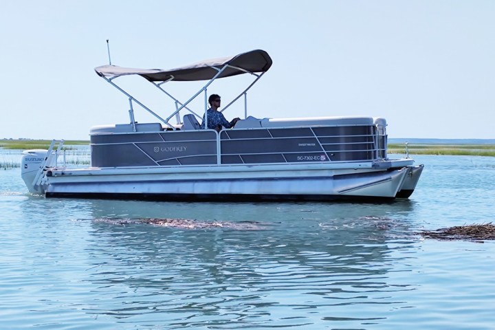 a small boat in a body of water