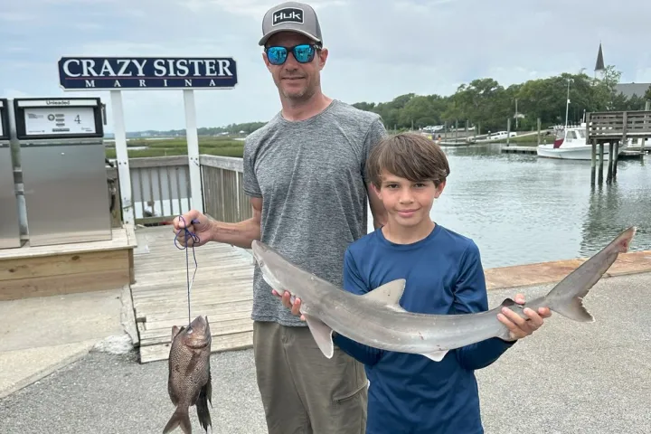 a man holding a sign