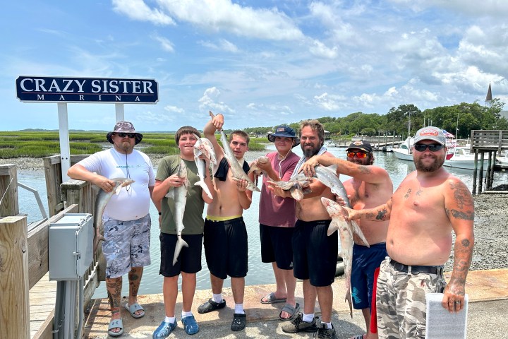 a group of people posing for the camera