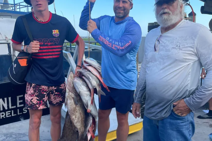 a group of people posing for the camera
