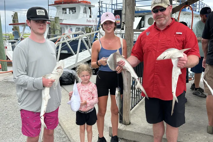 a group of people posing for the camera