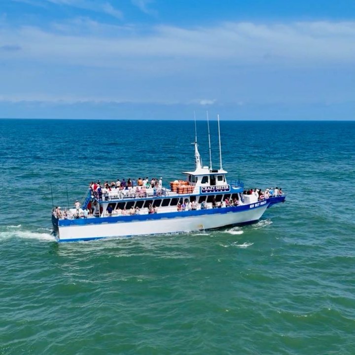 a small boat in a large body of water