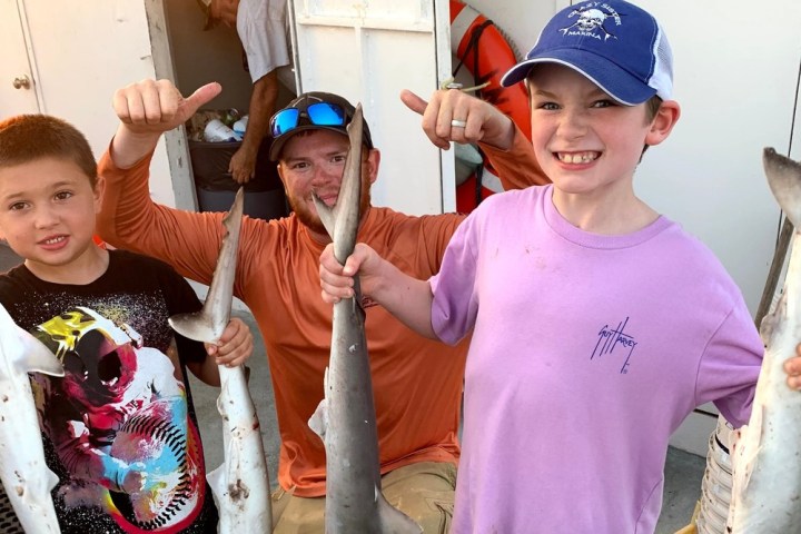 a group of people posing for the camera