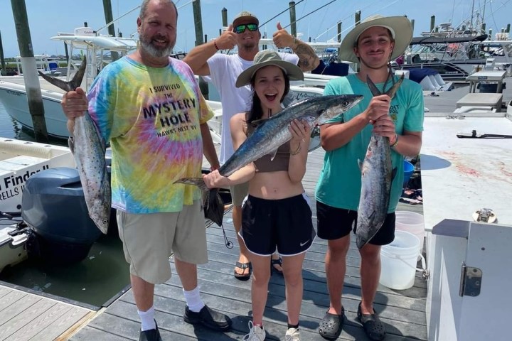 a group of people posing for the camera