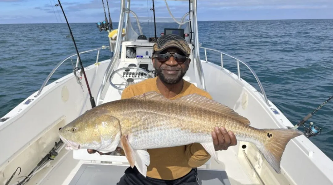 Catching A Big Fish On An Offshore Fishing Trip Catching A Big Fish On An Offshore Fishing Trip