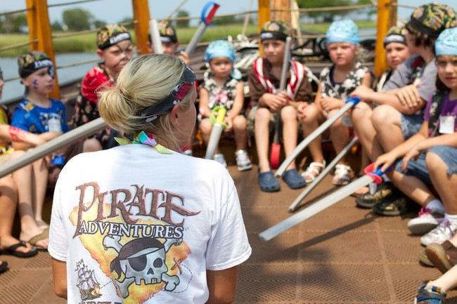 Children’s Pirate Adventure Image 6 a group of people standing in front of a crowd