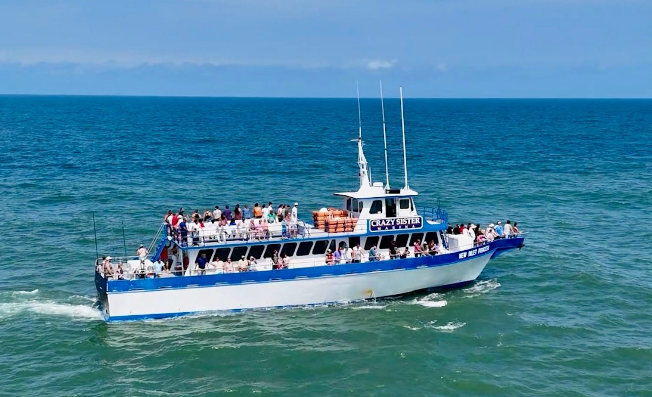 24 Hour Overnight Fishing Trip Image 1 a large boat in a body of water