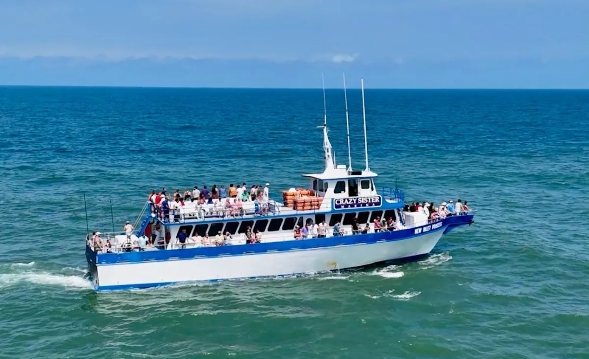 24 Hour Overnight Fishing Trip Image 1 a large boat in a body of water