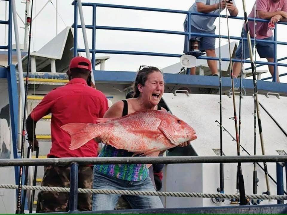 24 Hour Overnight Fishing Trip Image 5 a person holding a fish
