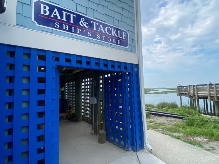 Crazy Sister Marina Bait Shop a sign on the side of a building