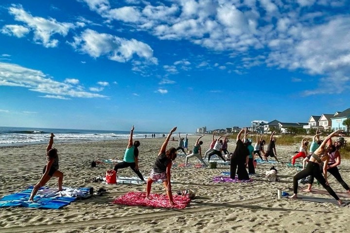 a group of people on a beach
