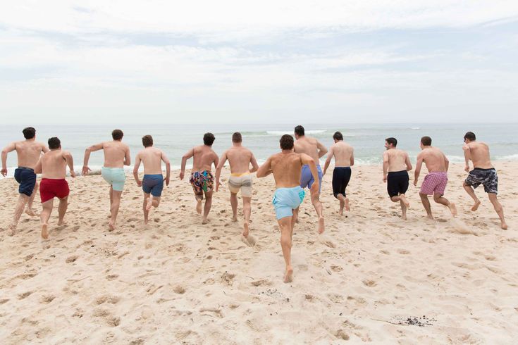 Bachelor Party Myrtle Beach a group of people enjoying a bachelor party on a beach