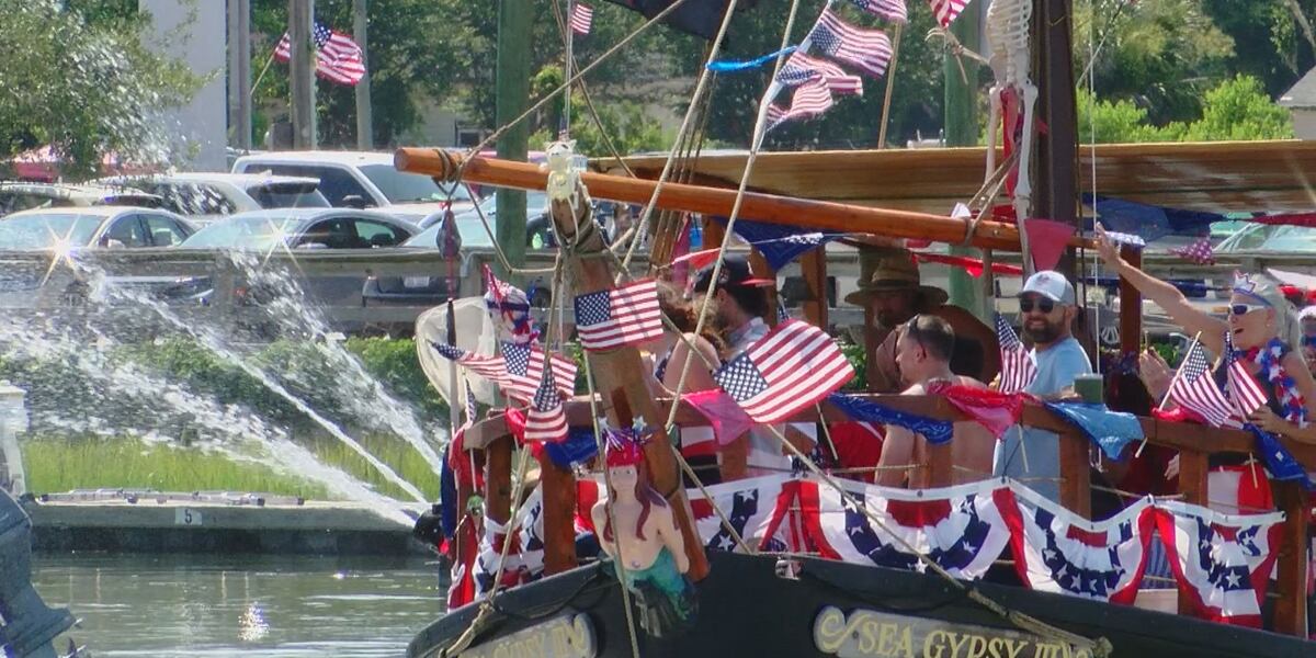 Pirate Boat Murrells Inlet 4th of July a group of people riding on the back of a boat