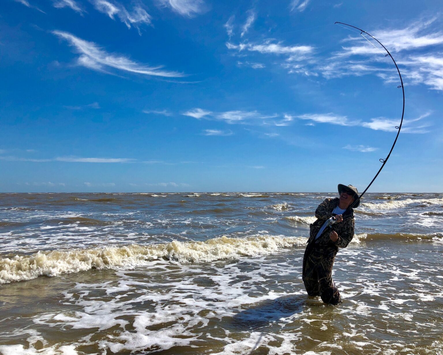 Shore Fishing Myrtle Beach Murrells Inlet a man standing next to a body of water fishing