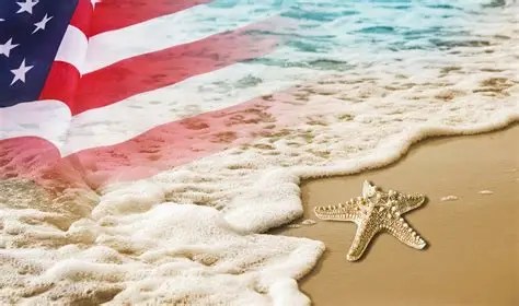 Labor Day Myrtle Beach 2025 American flag over beach, waves washing over a starfish on the sand.