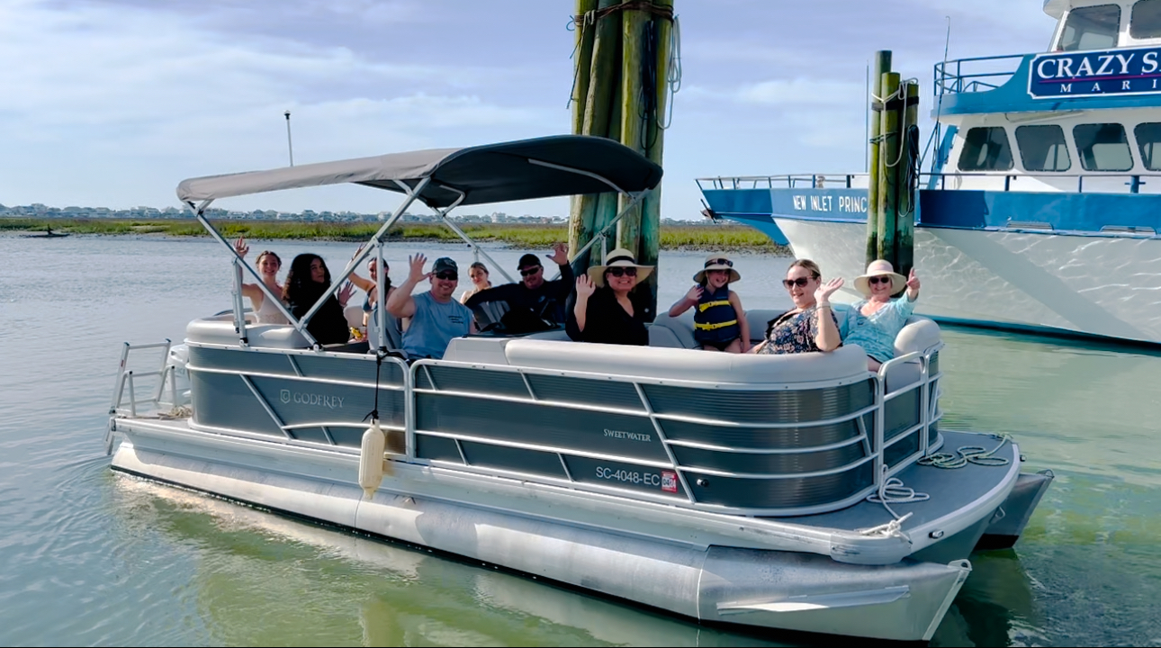 Crazy Sister Marina customers relaxing on the beach after a boat tour.