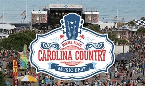 Crowd at Myrtle Beach Carolina Country Music Fest with stage and ocean backdrop.